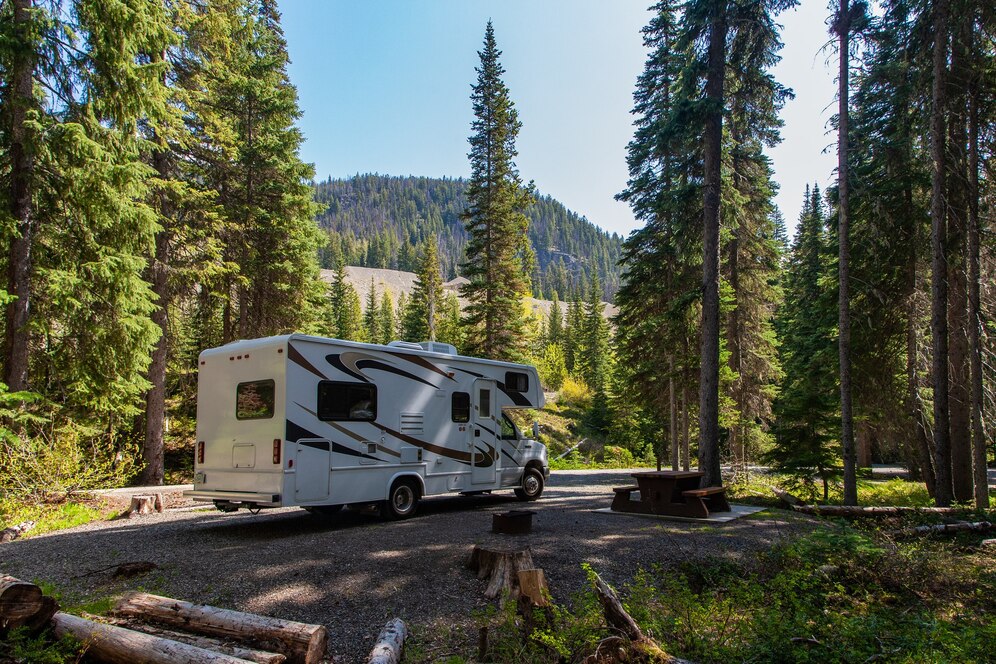 beautiful-campsite-mountains-with-rv-wooden-bench_181624-46208 RV solar power